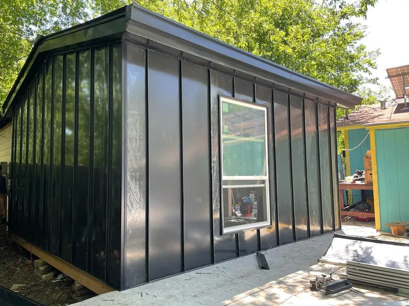 Black standing seam metal wall panels for Roof Inspection in Superior