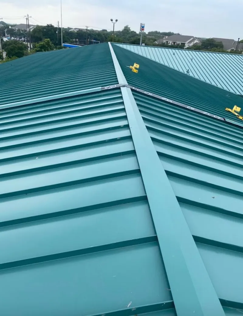 Green commercial metal roof ridge and valley for Metal Roof Repair in Superior